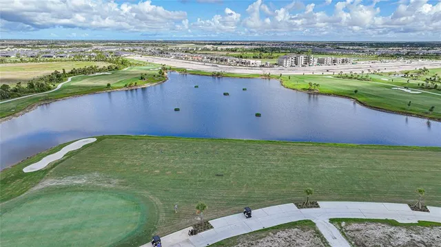 a view of a swimming pool with a garden