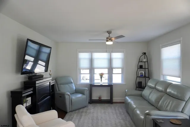 a kitchen with a stove a sink and a microwave