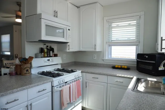 a view of a table and chairs in patio