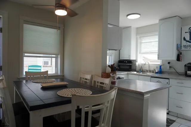 a view of a chairs and table in the patio