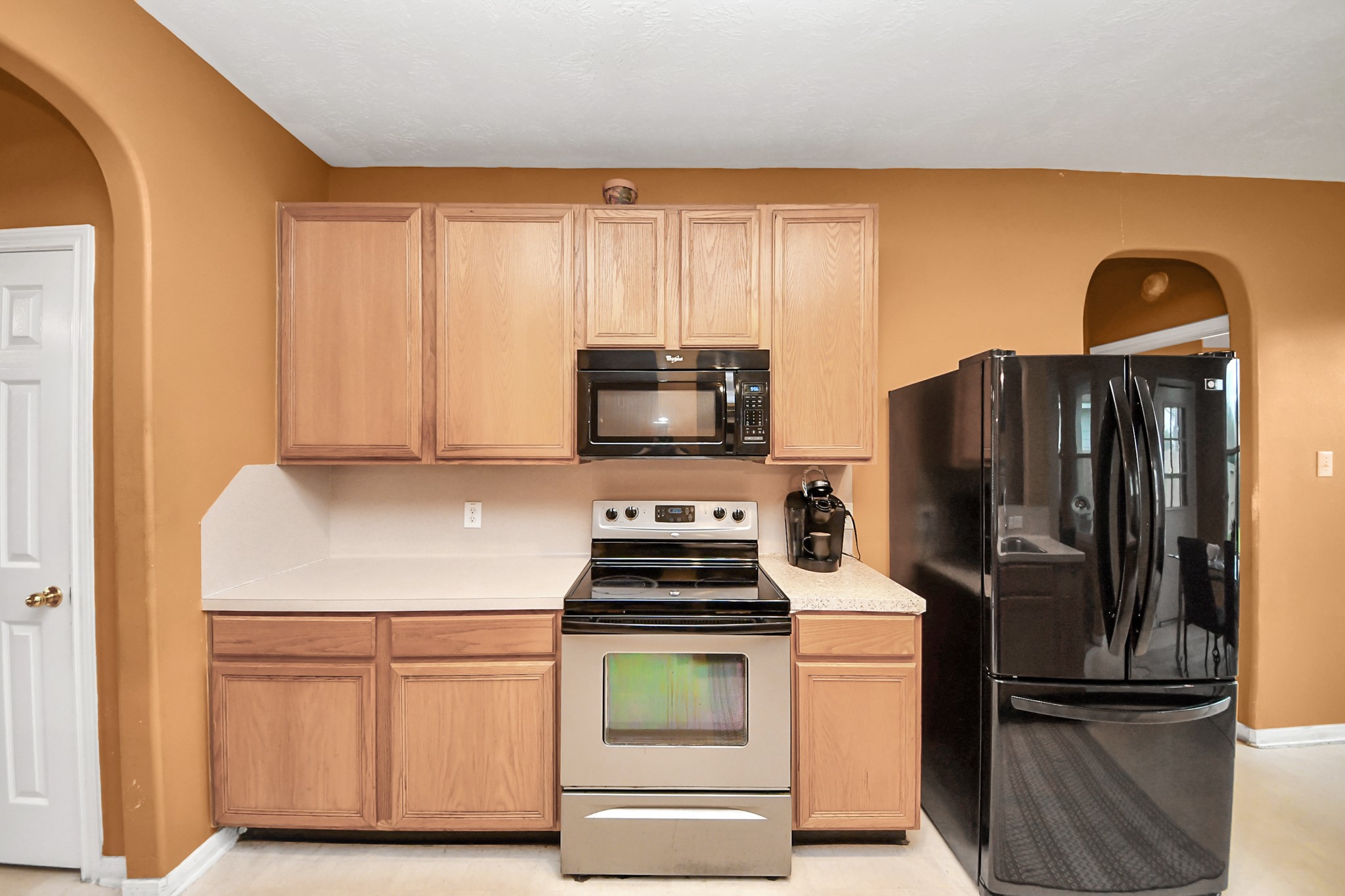 23814 Spring Dane Drive Spring, TX 77373 - Photo 20 of 41 a kitchen with appliances cabinets and a sink