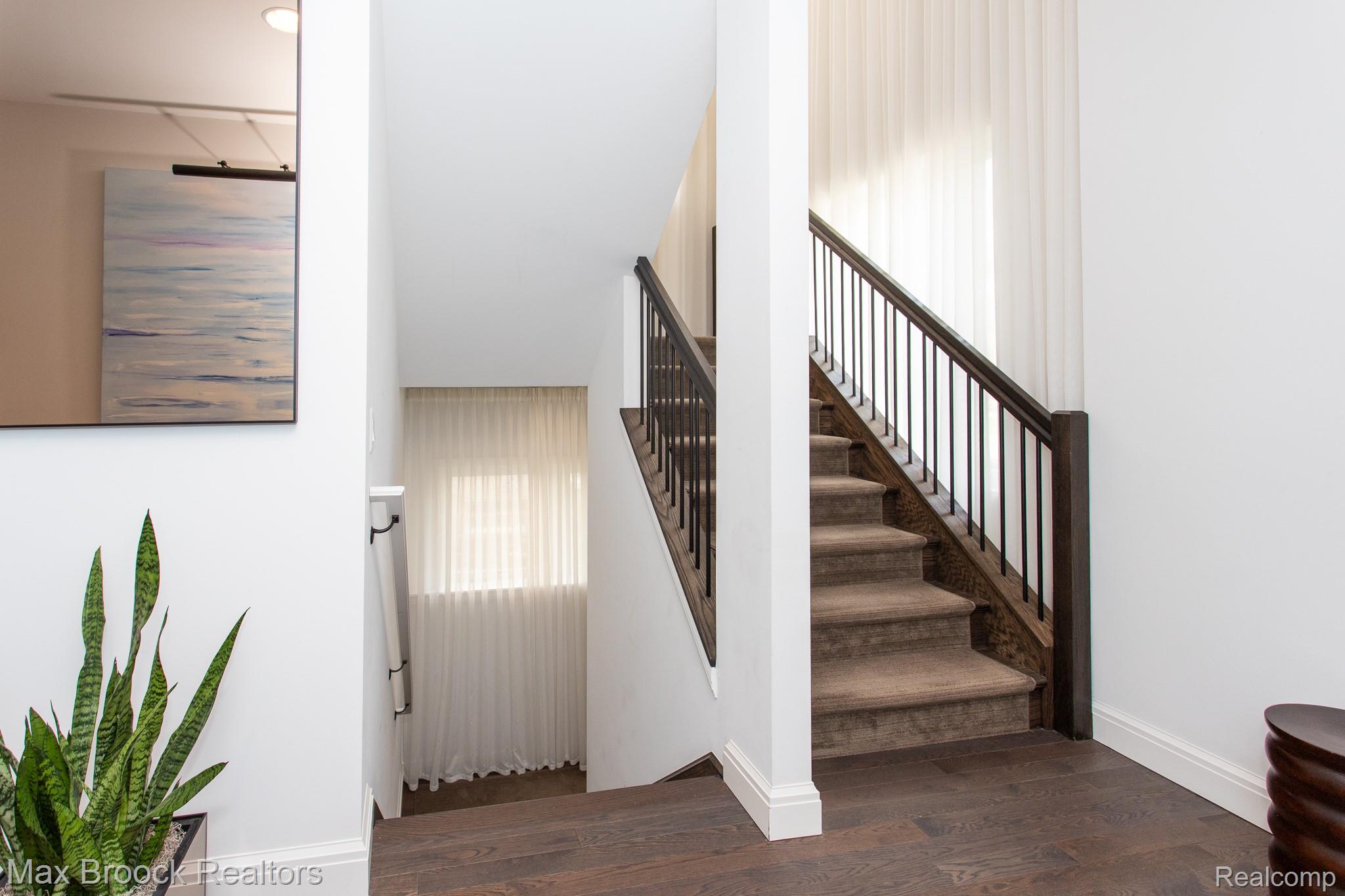 25925 York Road Royal Oak, MI 48067 - Photo 70 of 88 Stairway with wood finished floors and baseboards