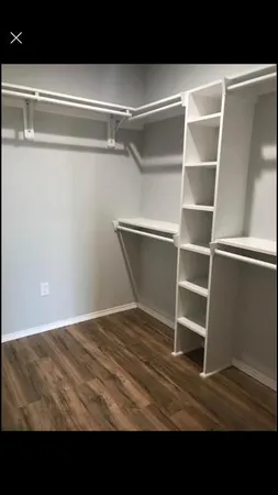 a view of an empty room with empty racks