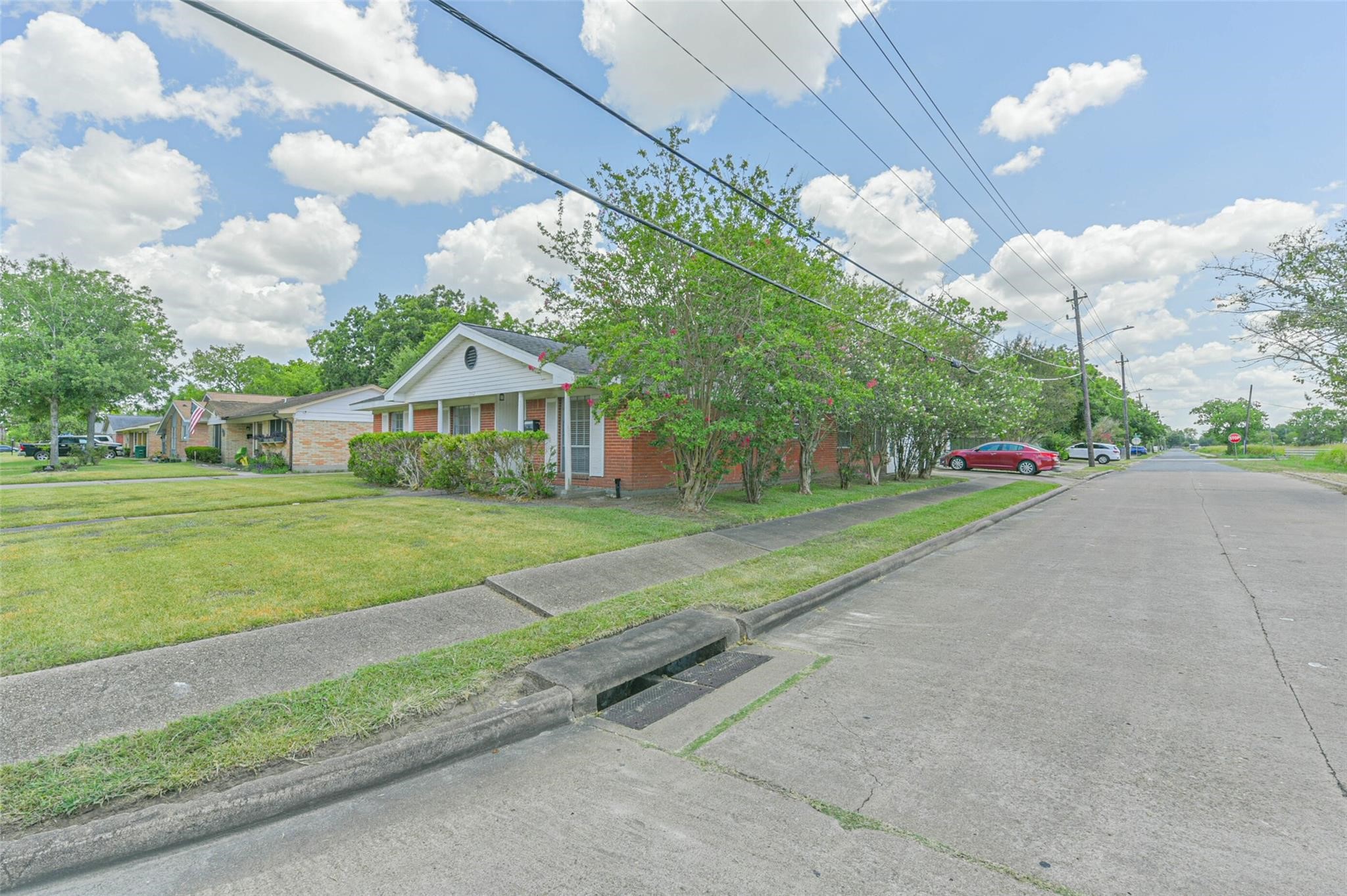 12002 Palmcroft Street Houston, TX 77034 - Photo 16 of 16 a view of house with outdoor space and street view
