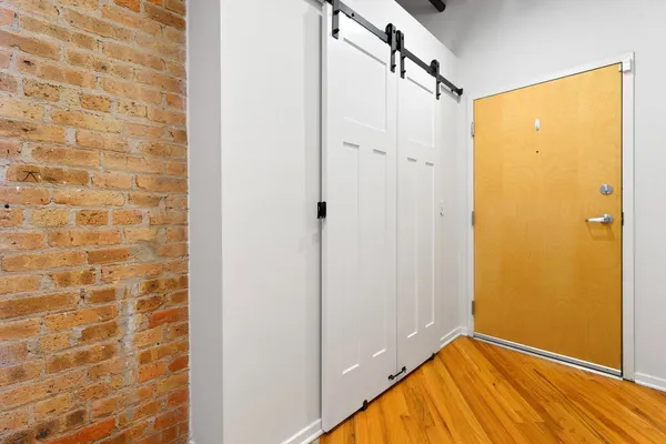 a view of a bathroom with a shower and a sink