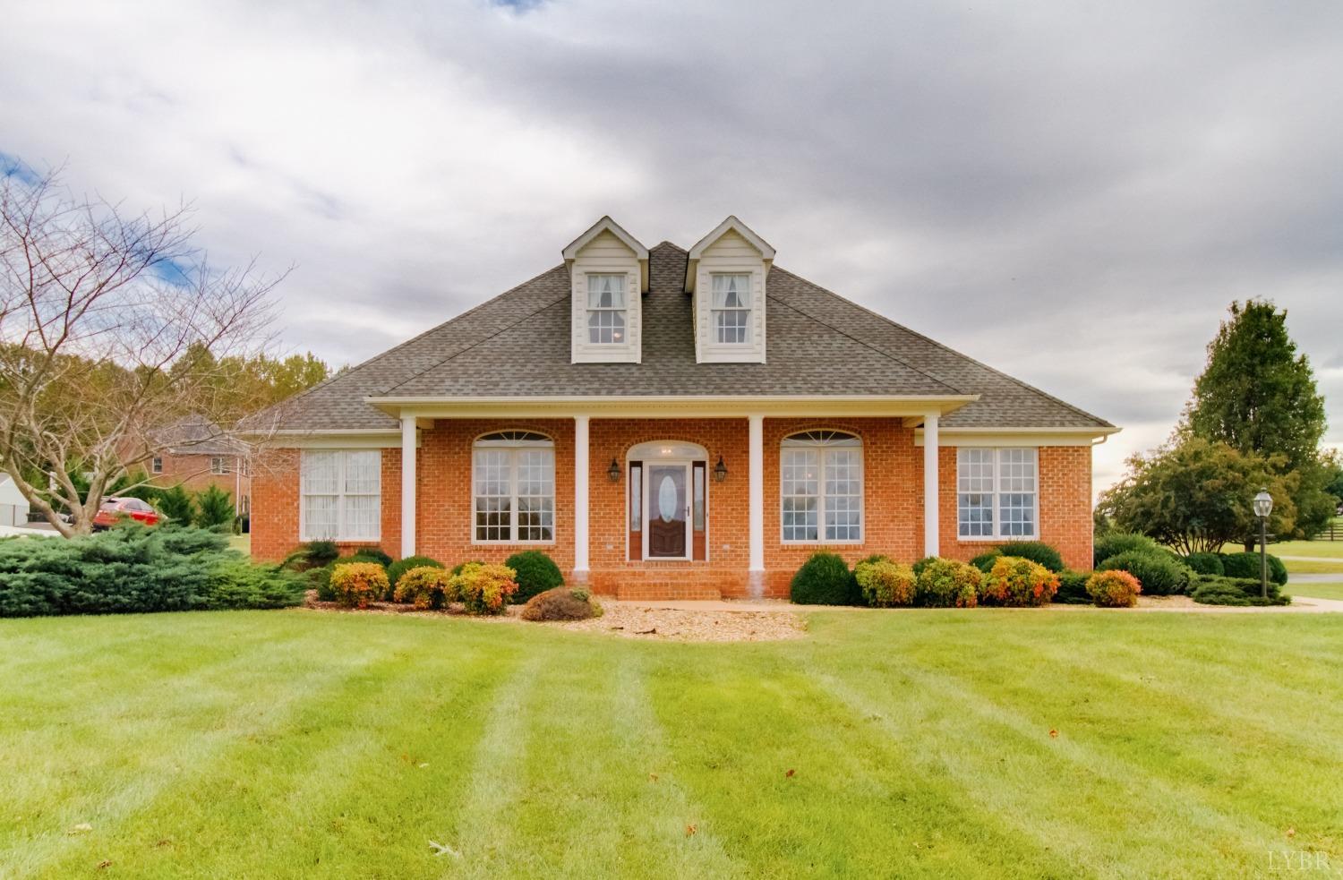 1228 Doyles Run Forest, VA 24551 - Photo 2 of 87 a front view of a house with a yard