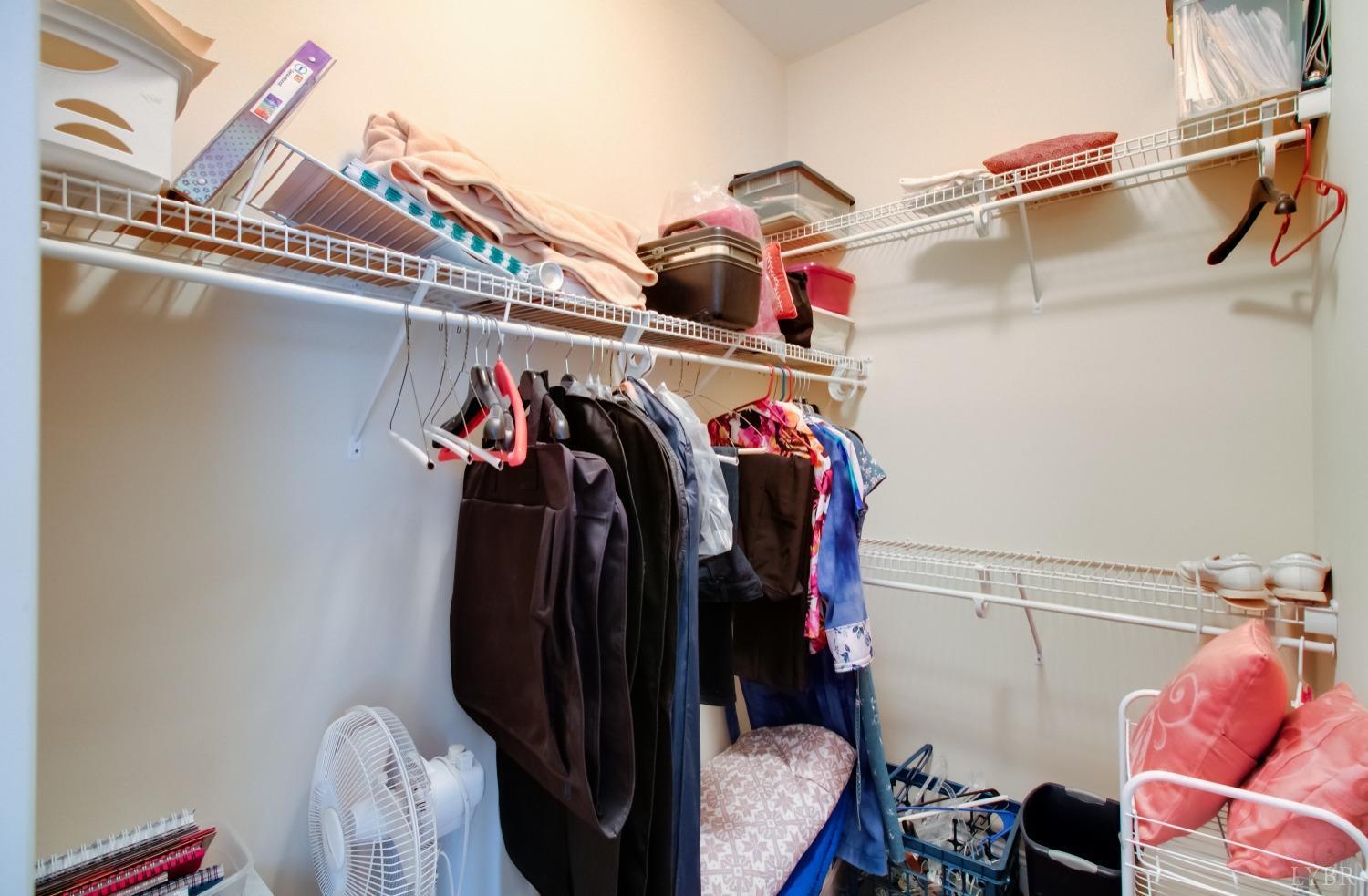 1228 Doyles Run Forest, VA 24551 - Photo 23 of 87 a view of walk in closet with clothes and shoes