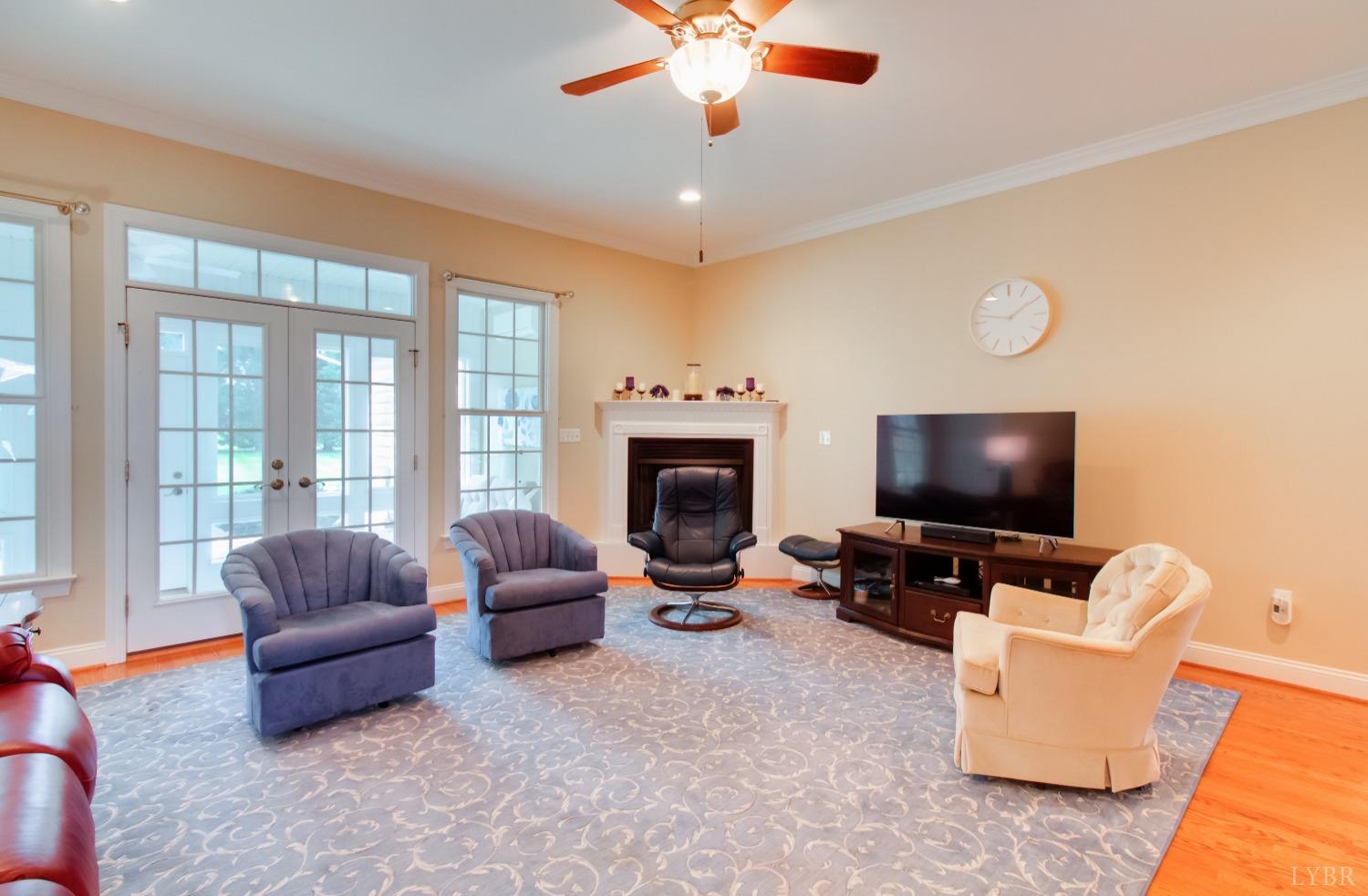 1228 Doyles Run Forest, VA 24551 - Photo 26 of 87 a living room with furniture and a flat screen tv