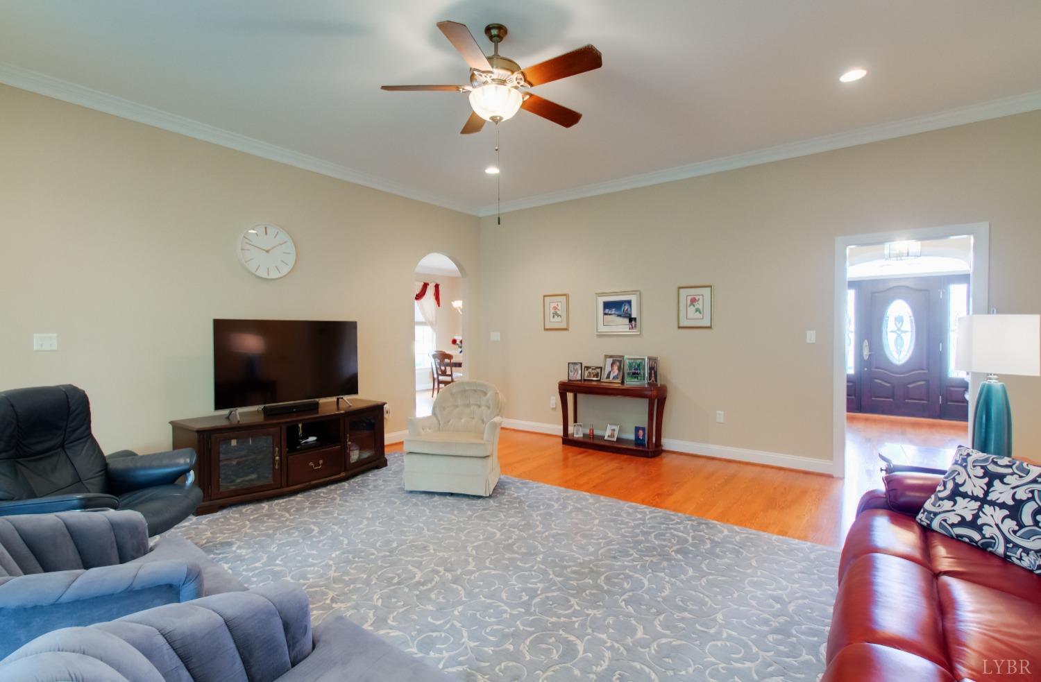 1228 Doyles Run Forest, VA 24551 - Photo 30 of 87 a living room with furniture and a flat screen tv