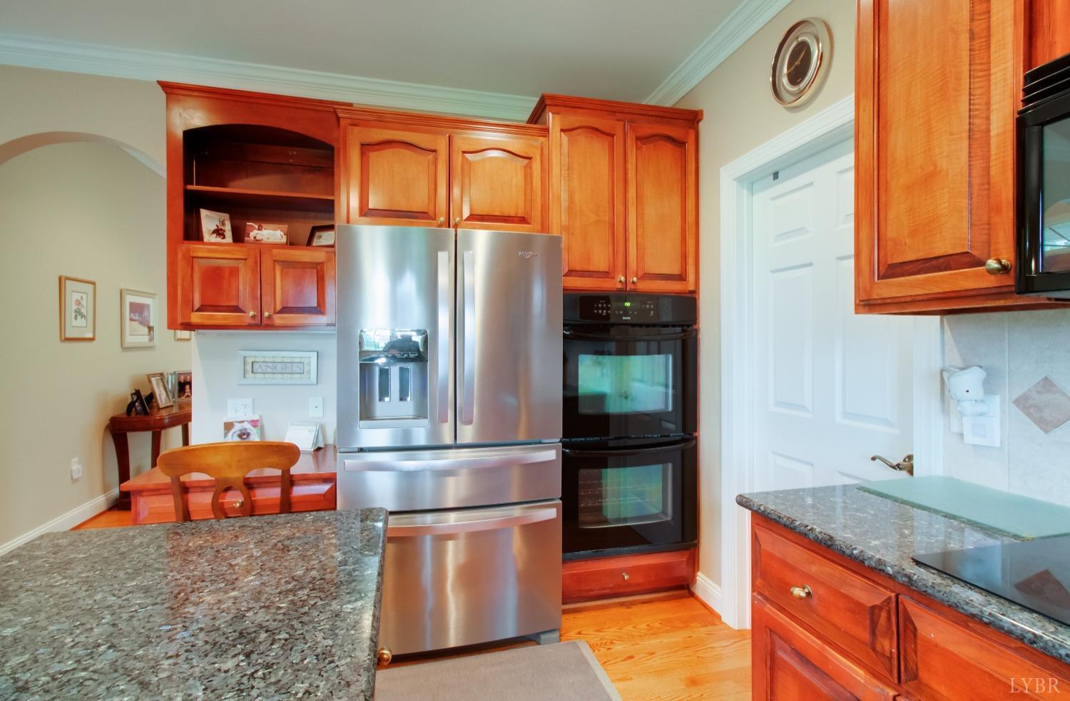 1228 Doyles Run Forest, VA 24551 - Photo 42 of 87 a kitchen with stainless steel appliances granite countertop a refrigerator and a sink