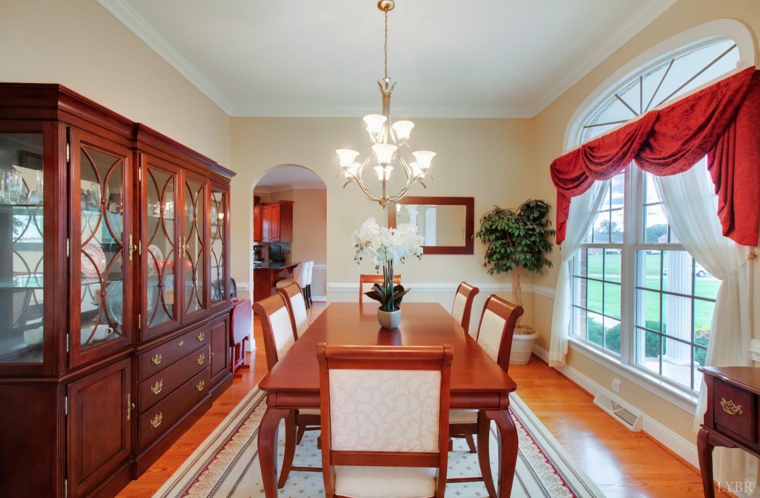 1228 Doyles Run Forest, VA 24551 - Photo 51 of 87 a view of a dining room with furniture a chandelier and wooden floor