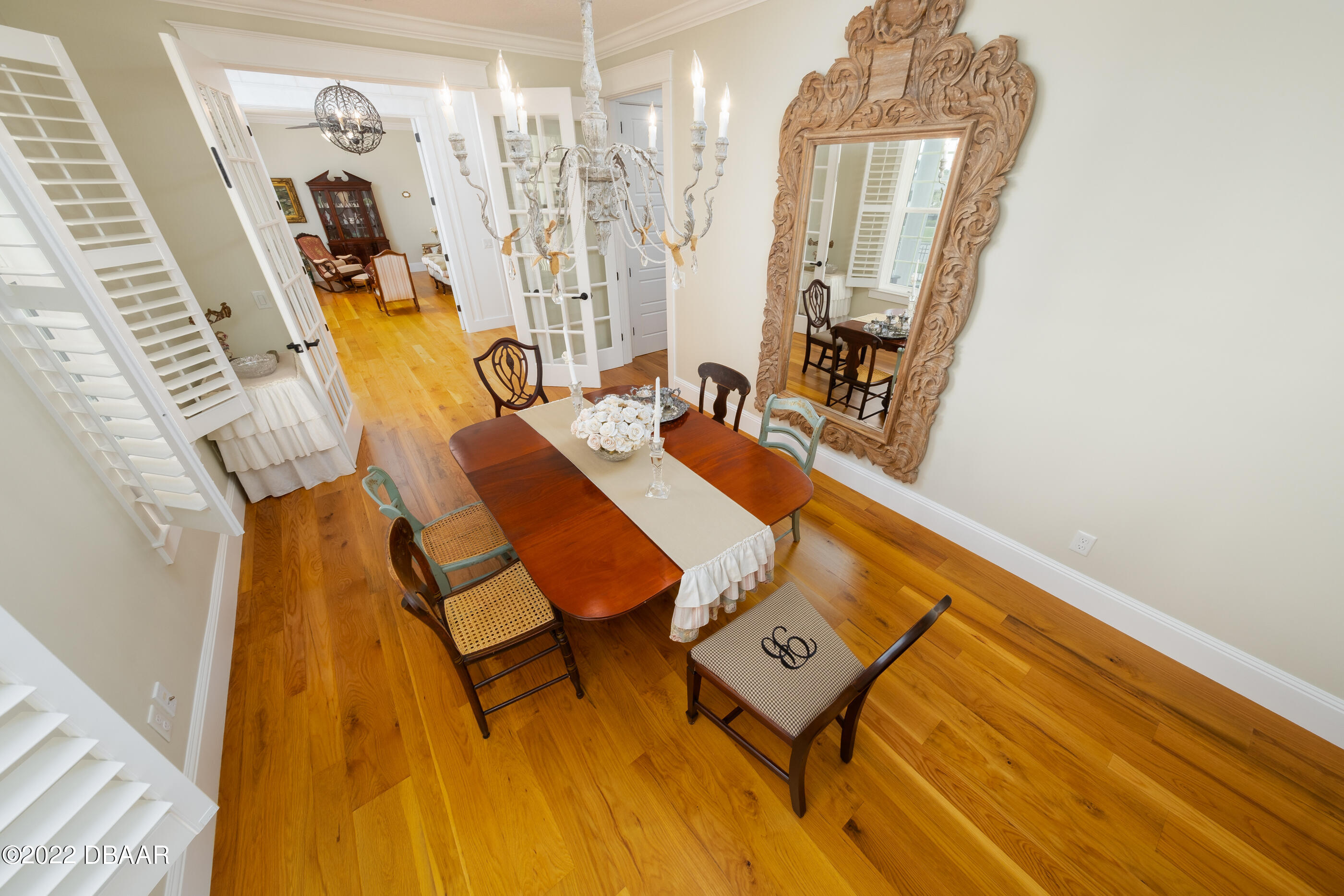 1212 South Riverside Drive New Smyrna Beach, FL 32168 - Photo 18 of 49 a view of a living room and dining room