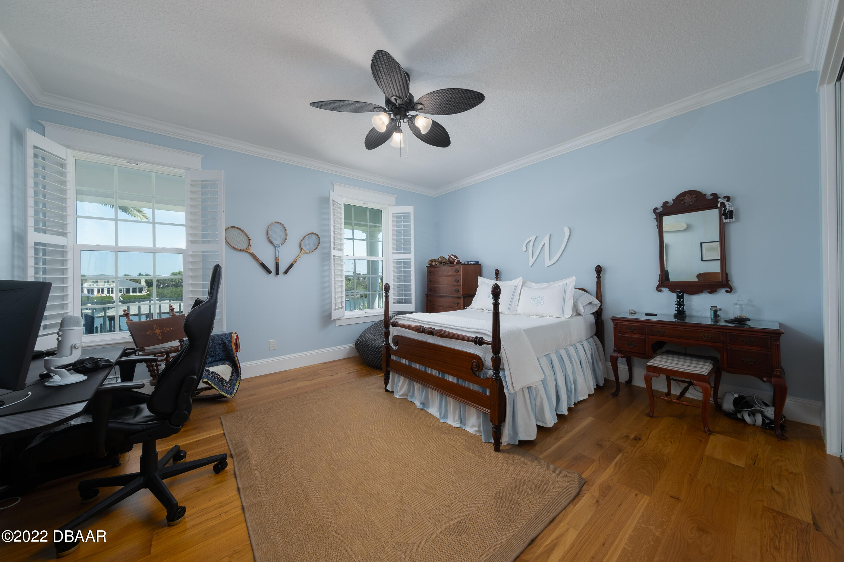 1212 South Riverside Drive New Smyrna Beach, FL 32168 - Photo 30 of 49 a bedroom with bed and a window