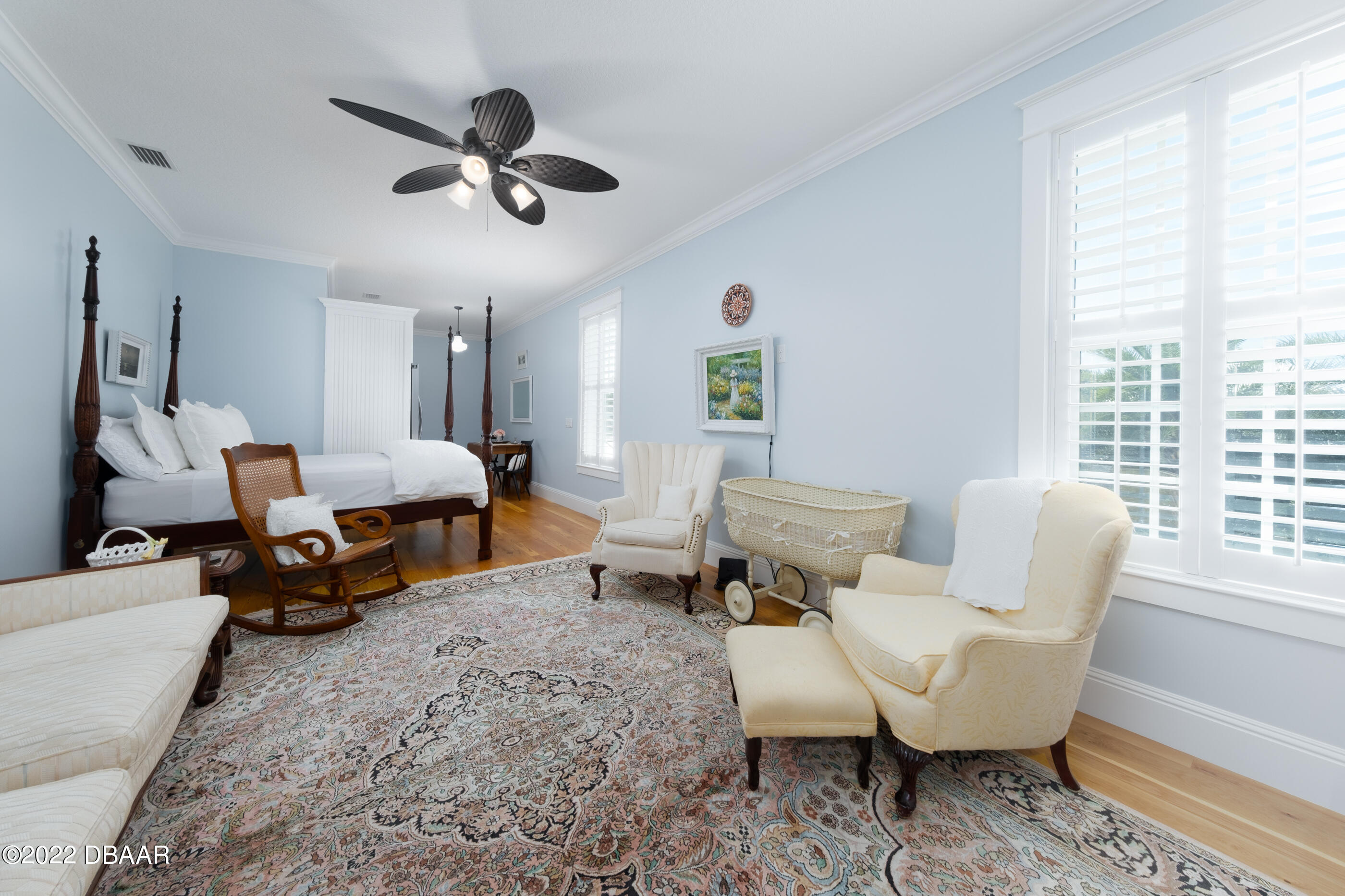 1212 South Riverside Drive New Smyrna Beach, FL 32168 - Photo 39 of 49 a living room with furniture and a window