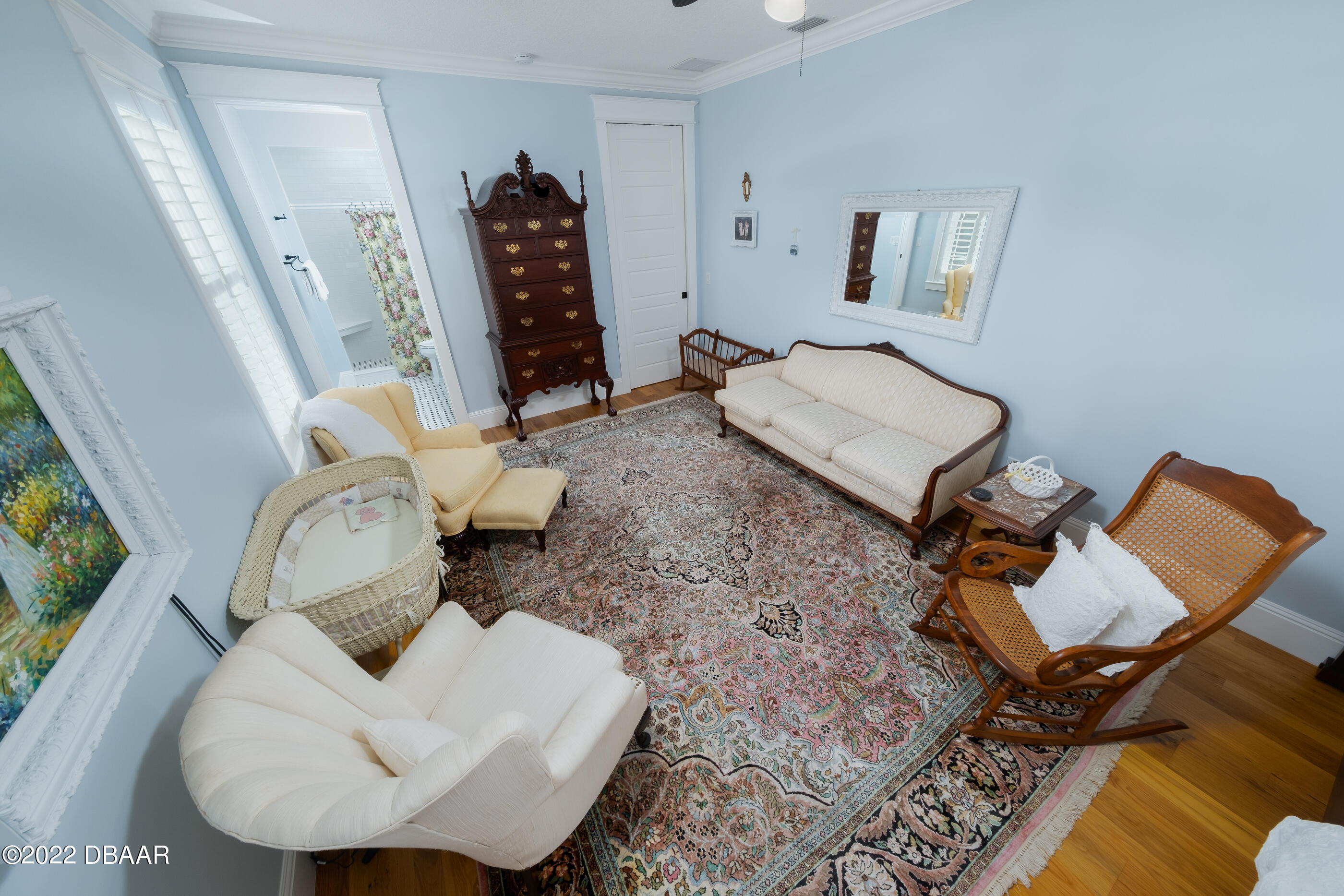1212 South Riverside Drive New Smyrna Beach, FL 32168 - Photo 40 of 49 a living room with furniture and a wooden floor