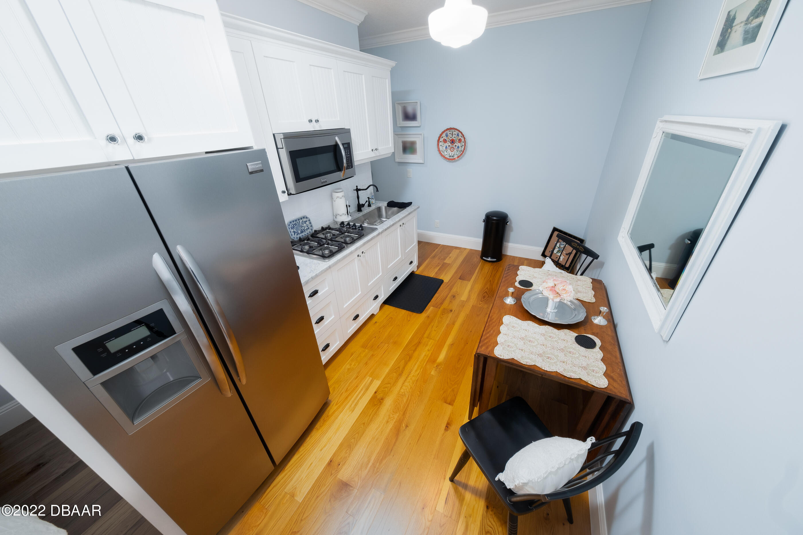 1212 South Riverside Drive New Smyrna Beach, FL 32168 - Photo 42 of 49 a living room with furniture and a flat screen tv