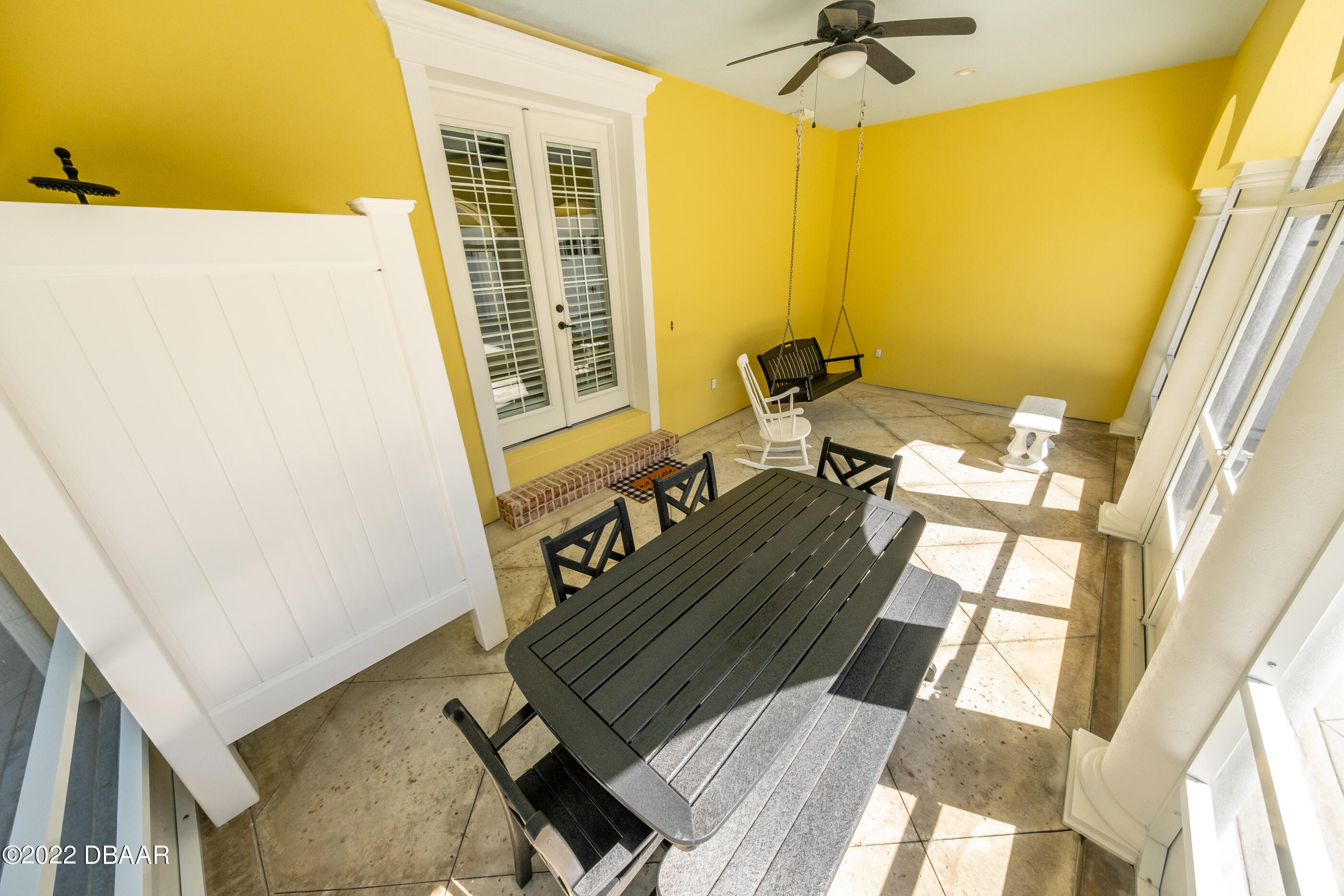 1212 South Riverside Drive New Smyrna Beach, FL 32168 - Photo 46 of 49 a living room with a bed furniture and a window