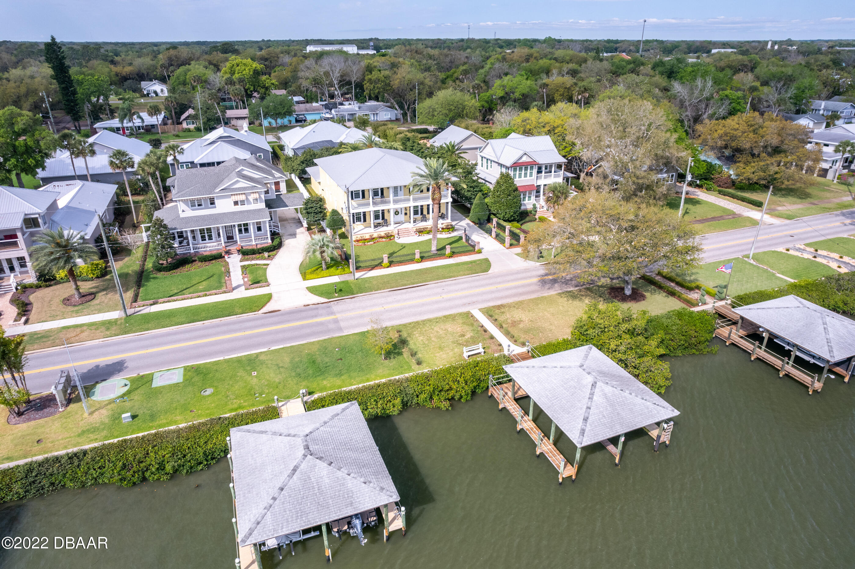1212 South Riverside Drive New Smyrna Beach, FL 32168 - Photo 7 of 49 an aerial view of a houses with a swimming pool