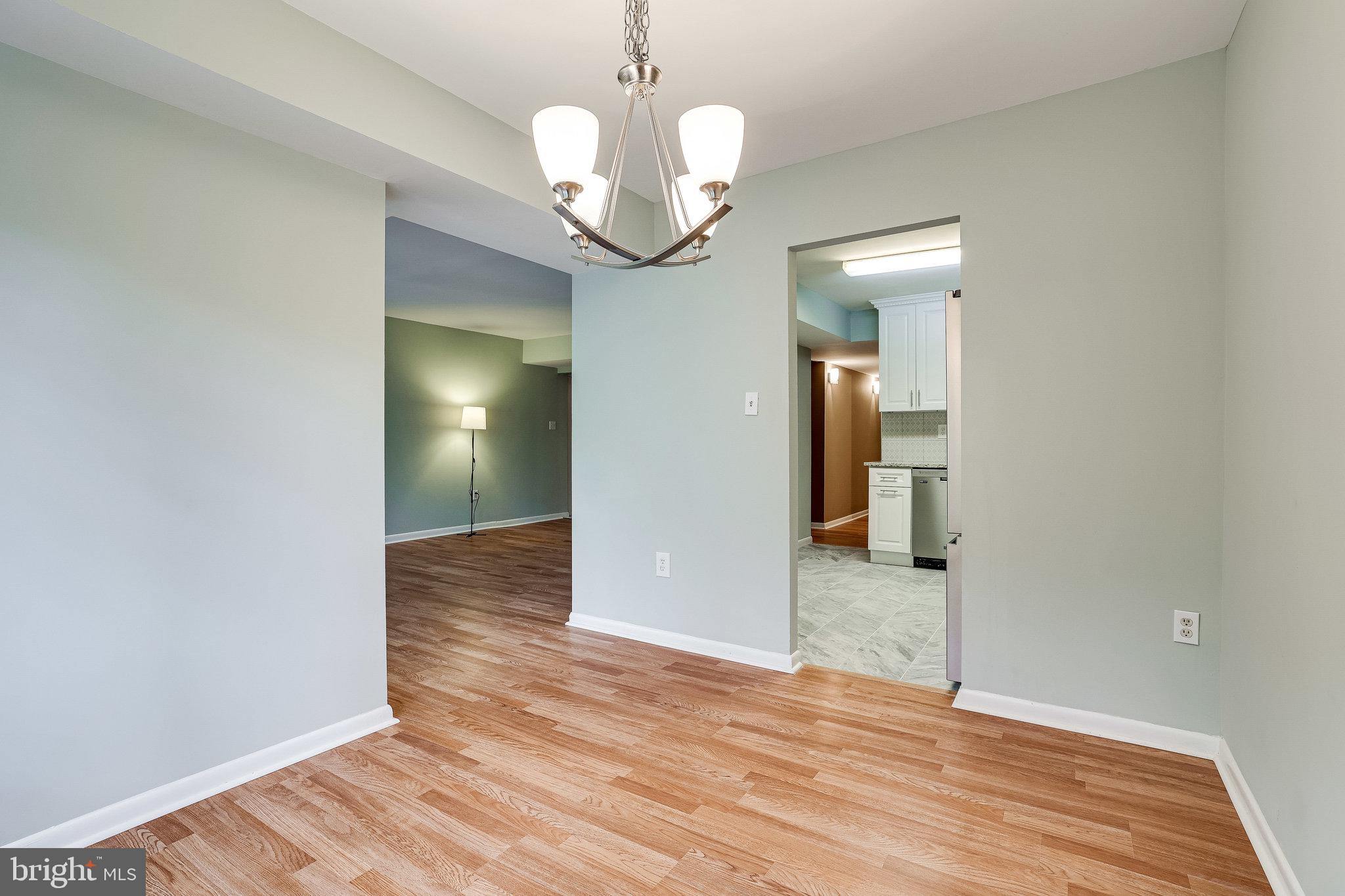 2210 Springwood Drive, Unit 207 Reston, VA 20191 - Photo 12 of 28 Dining Room view to Kitchen and Living Room