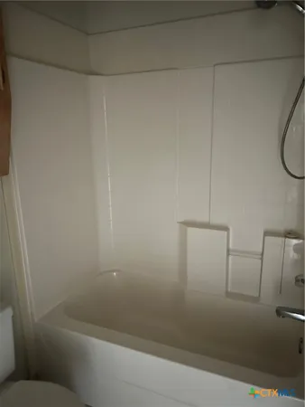 a view of room that has a utility room