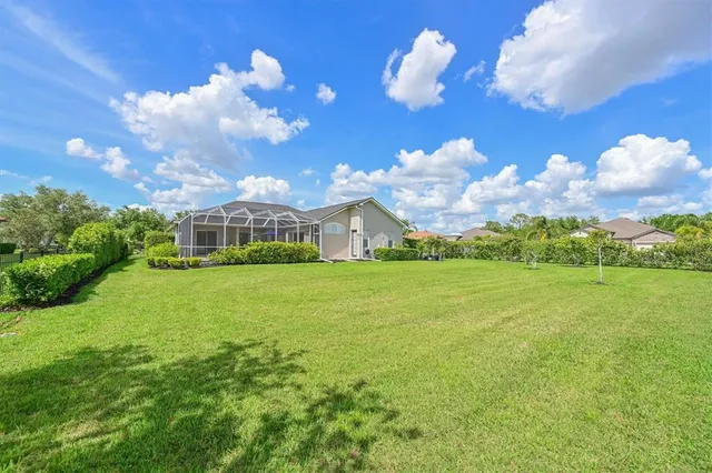a view of a house with a big yard