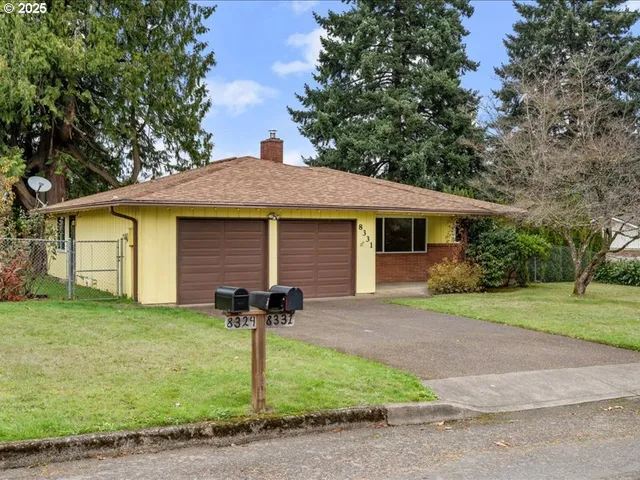 a front view of a house with yard