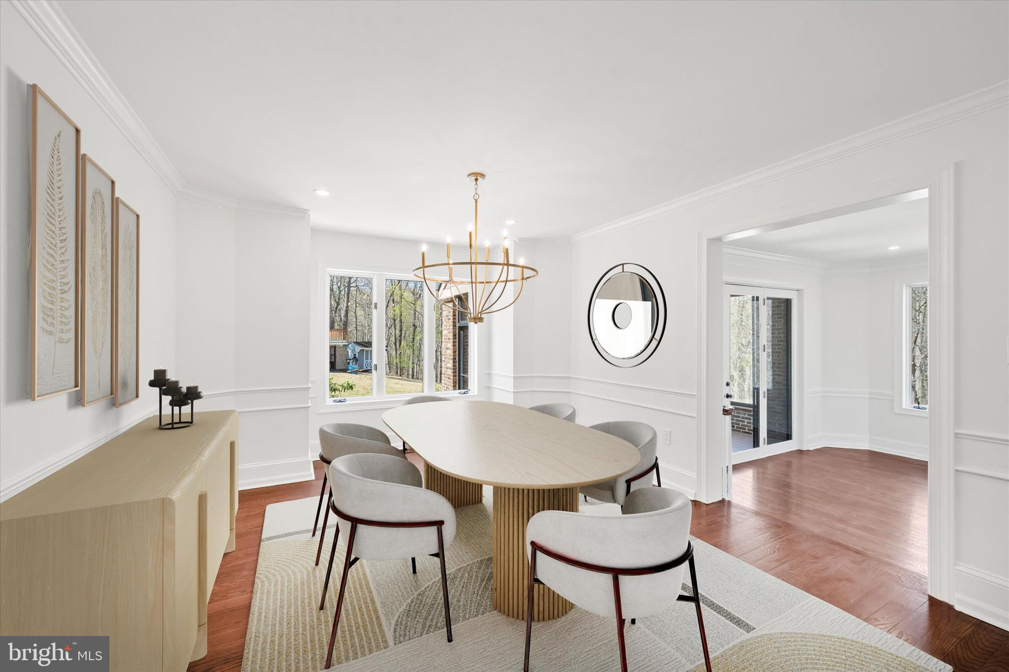 411 Hidden Valley Road Media, PA 19063 - Photo 46 of 90 a living room with dining table and a large window
