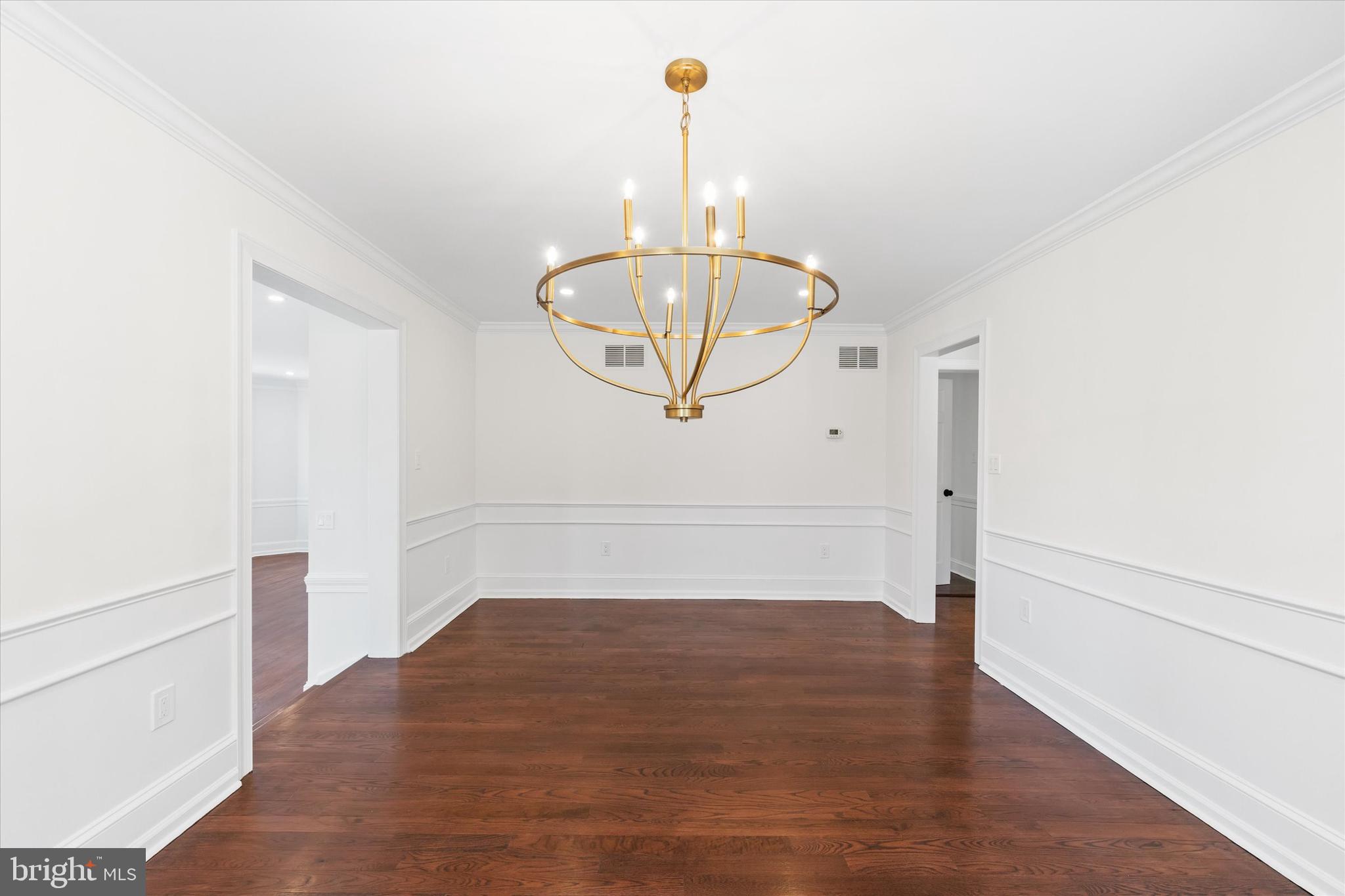 411 Hidden Valley Road Media, PA 19063 - Photo 49 of 90 a view of a room with wooden floor and white walls