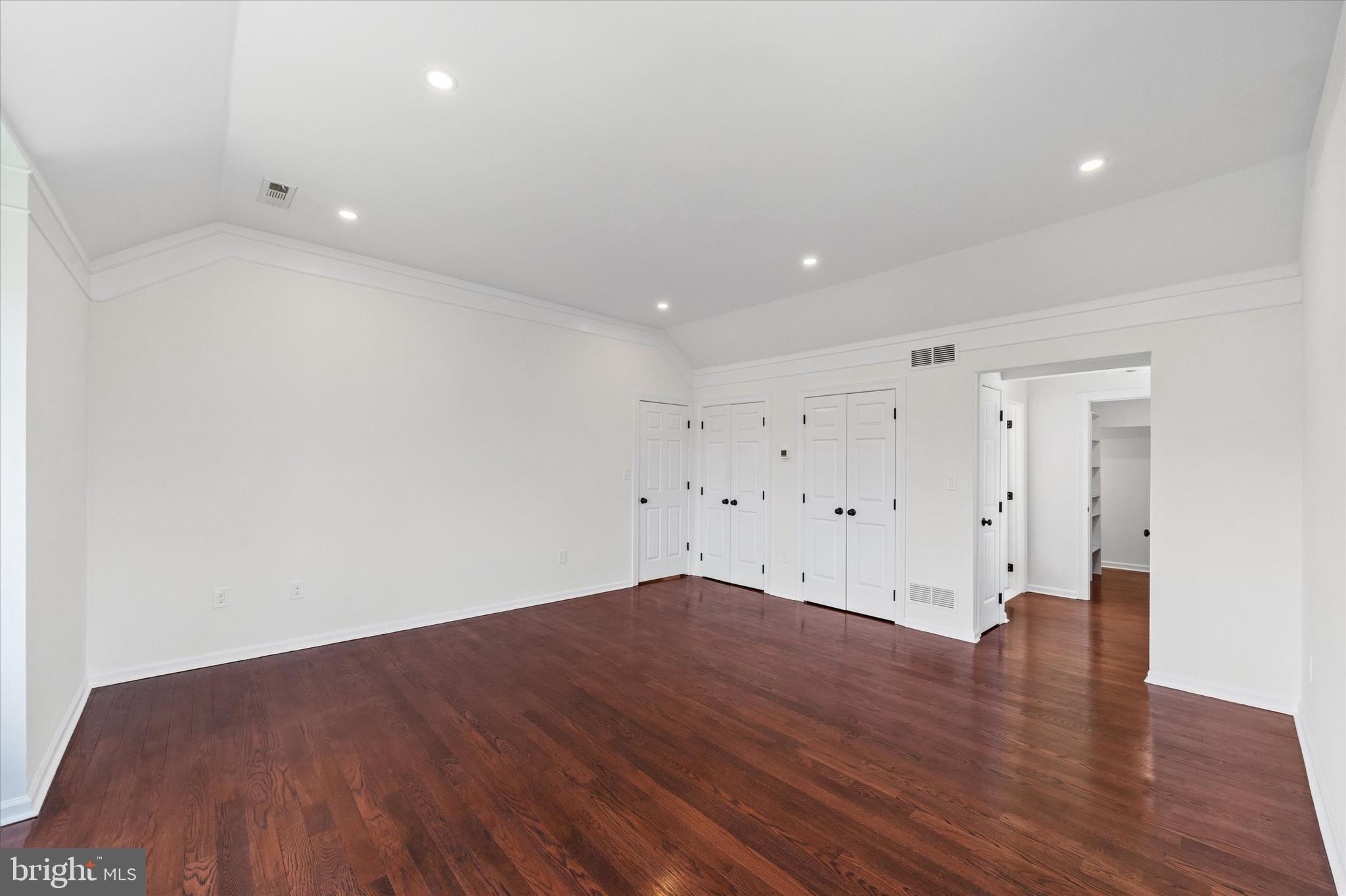 411 Hidden Valley Road Media, PA 19063 - Photo 51 of 90 a view of an empty room with wooden floor