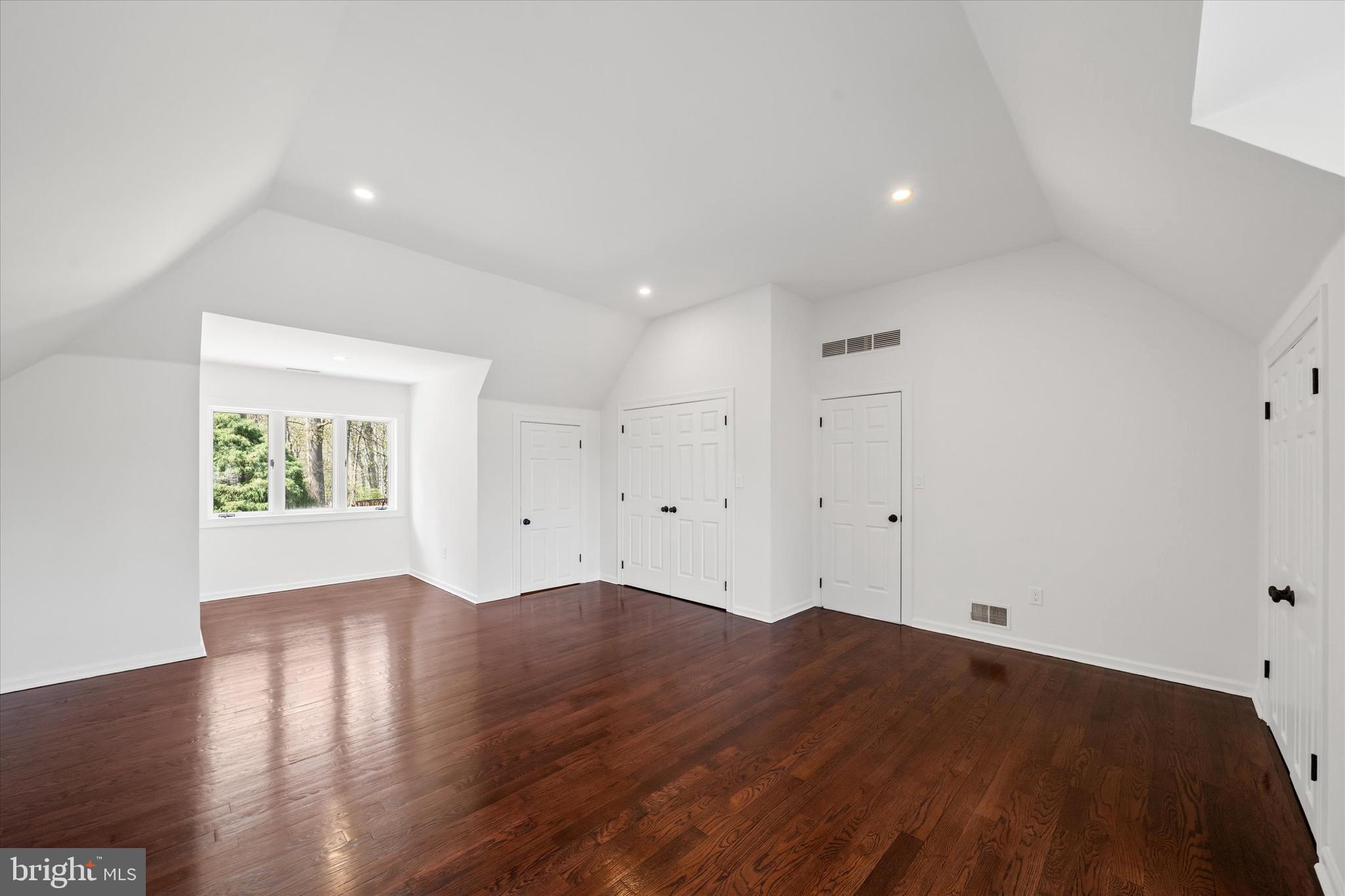 411 Hidden Valley Road Media, PA 19063 - Photo 68 of 90 a view of a big room with wooden floor and windows