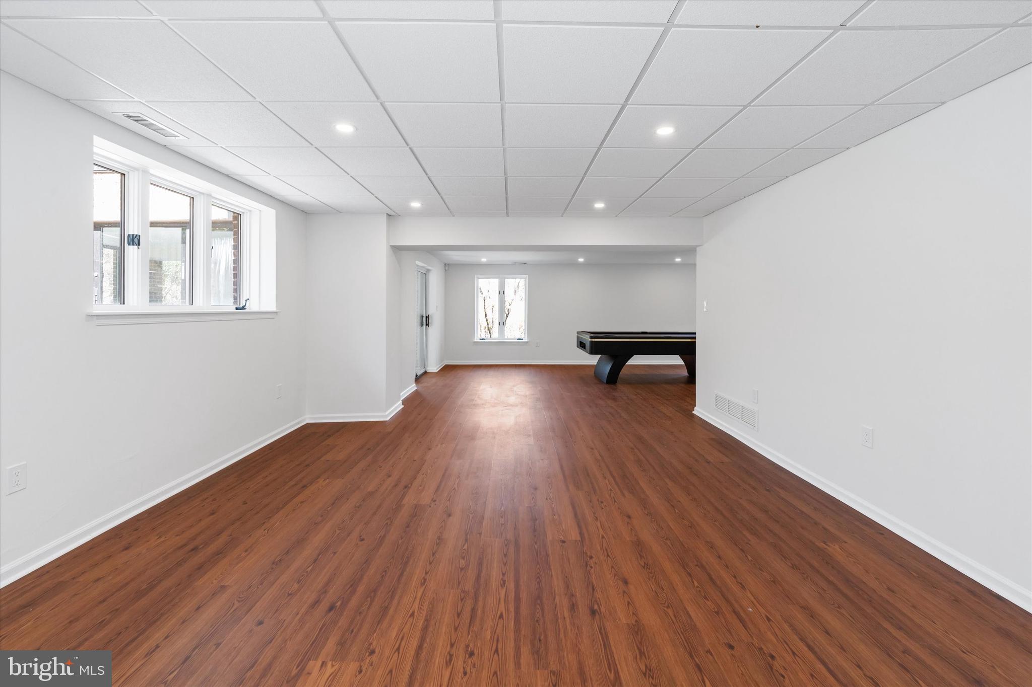 411 Hidden Valley Road Media, PA 19063 - Photo 74 of 90 a view of a room with wooden floor and furniture