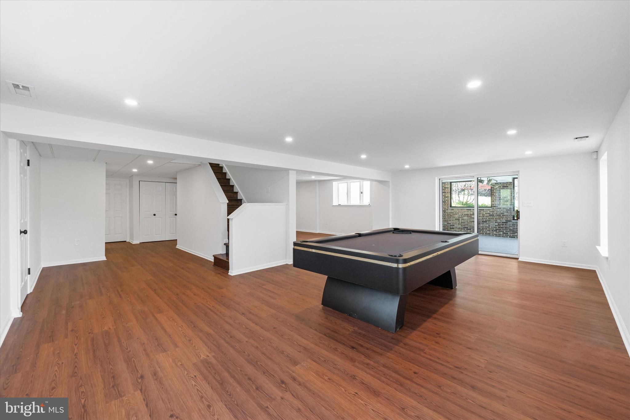 411 Hidden Valley Road Media, PA 19063 - Photo 78 of 90 a living room with a dresser and a wooden floor