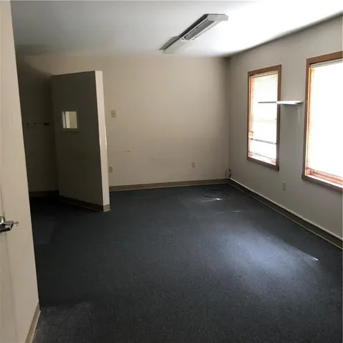 an empty room with a window