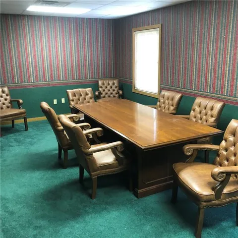 a view of an empty room with empty shelves