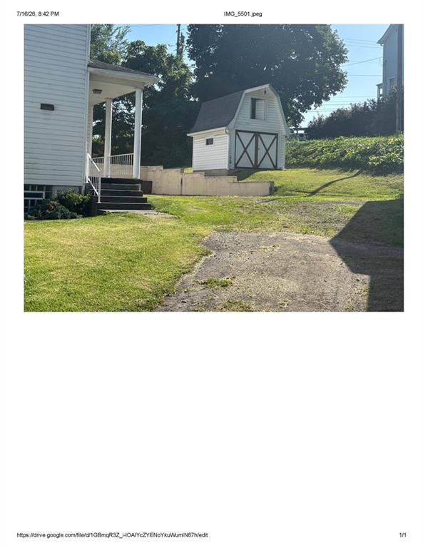 1139-1143 New Stanton Ruffsdale Road, Unit CYNKAR Ruffs Dale, PA 15679 - Photo 24 of 29 a view of a house with backyard and a garden