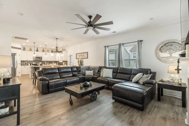 a kitchen with a sink stove top oven and cabinets