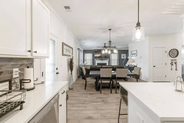 a room with furniture and a flat screen tv