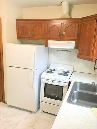 a utility room with washer and dryer