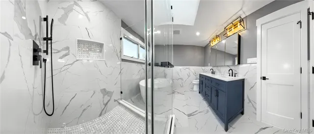 a bathroom with a sink and mirror