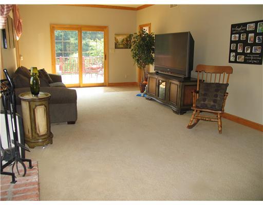 Den/Family/Great Room. Great Room with fireplace and  access to Rear Deck