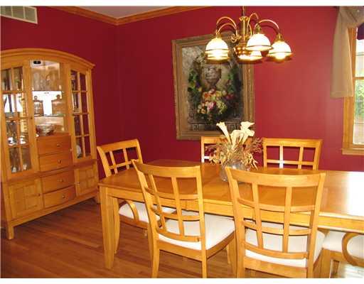 Dining Room. Lite and bright Formal Dining Room with Gleaming Hardwood Floors