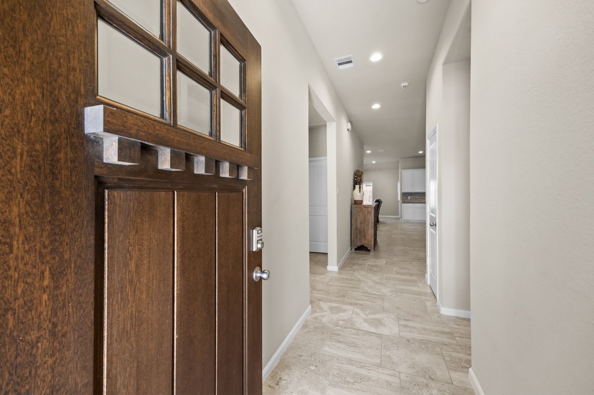 519 Yellow Bullhead Court Rosenberg, TX 77469 - Photo 4 of 24 a view of a hallway with wooden shelves