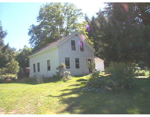 29 Amherst Road Pelham, MA 01002 - Photo 1 of 1 a house view with a garden space