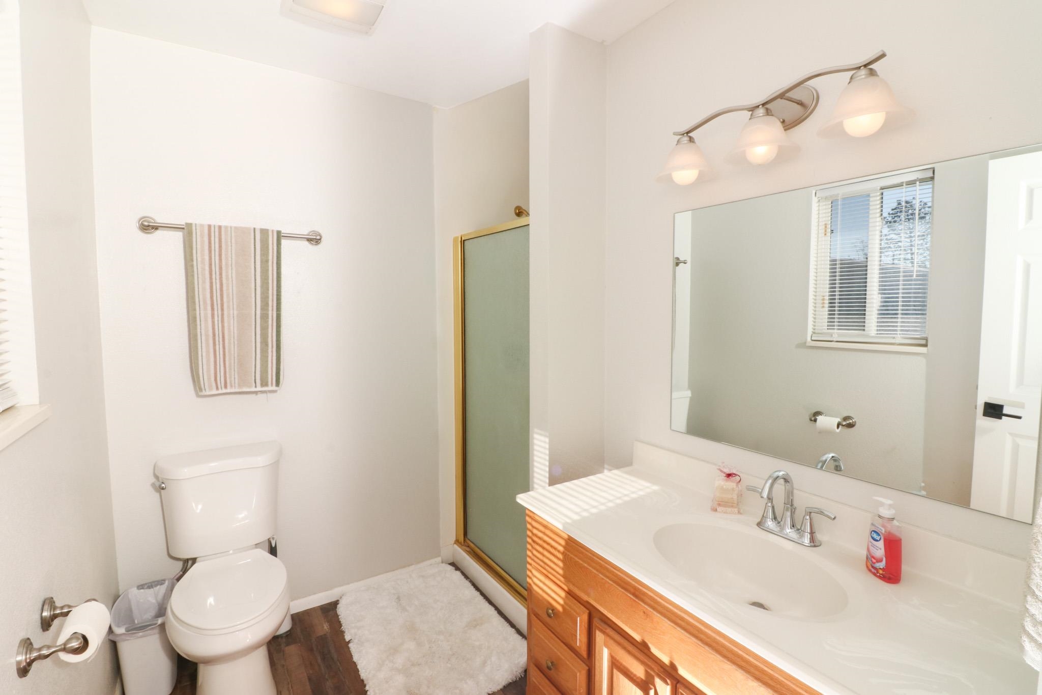 607-28 28 3/4 Road Grand Junction, CO 81506 - Photo 18 of 42 a bathroom with a sink toilet vanity and shower