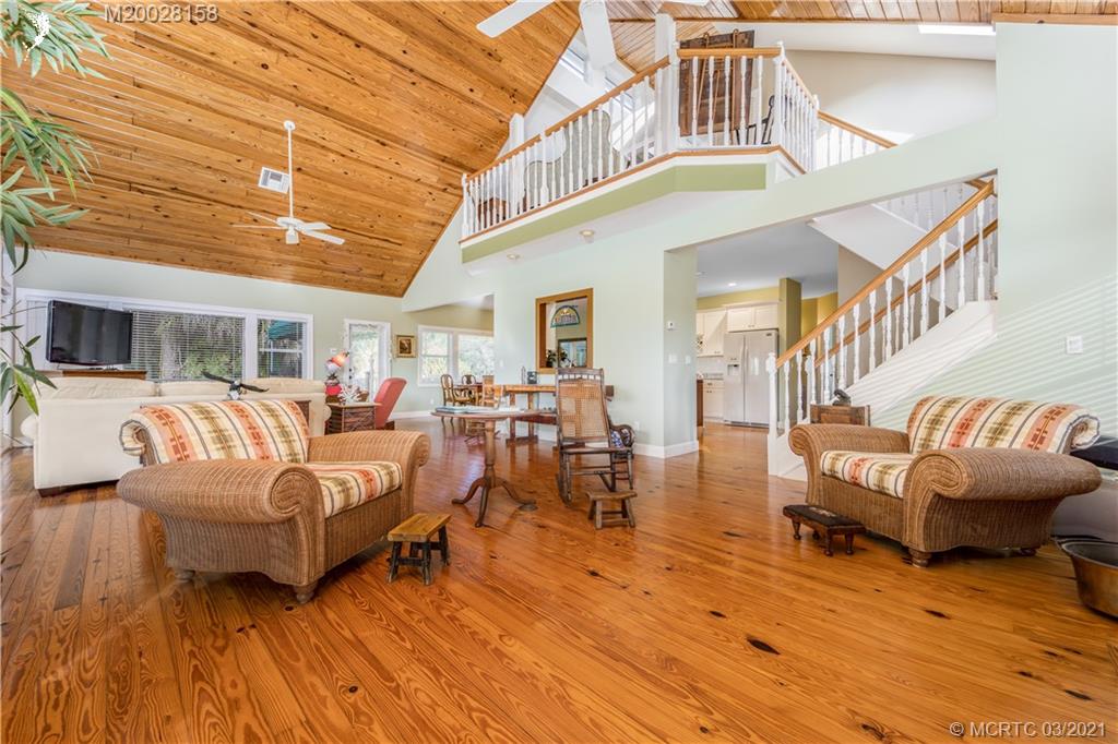 669 Southwest Linden Street Stuart, FL 34997 - Photo 8 of 43 Solid Wood flooring throughout expansive living areas