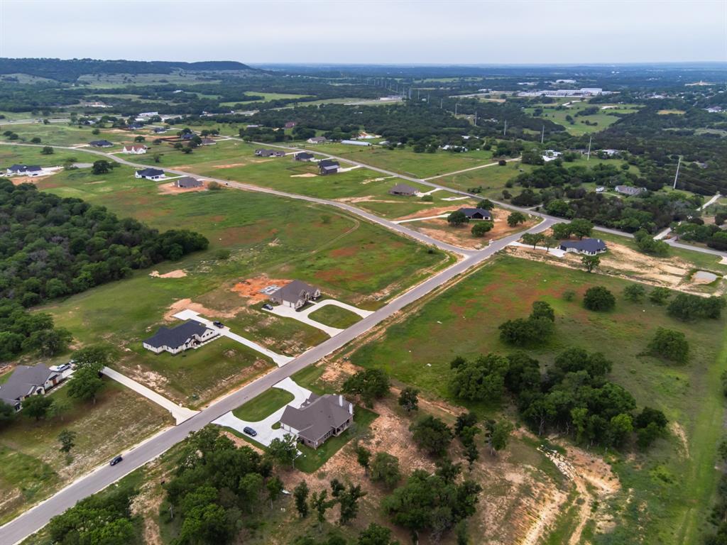 700 Rc Luker Court Granbury, TX 76048 - Photo 2 of 9 an aerial view of residential houses with outdoor space