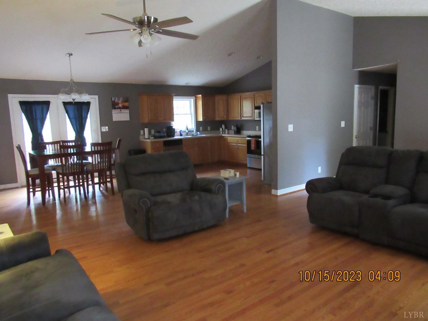 1360 Greenhouse Road Rustburg, VA 24588 - Photo 12 of 29 a living room with furniture and wooden floor
