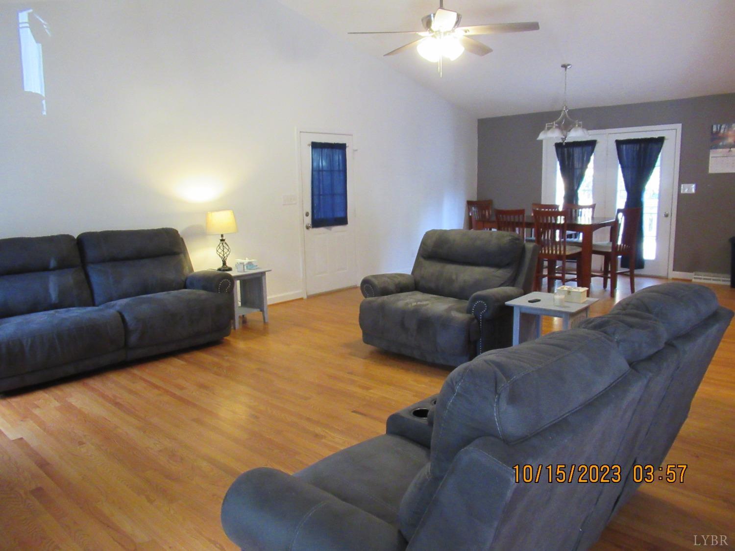 1360 Greenhouse Road Rustburg, VA 24588 - Photo 9 of 29 a living room with furniture and a flat screen tv