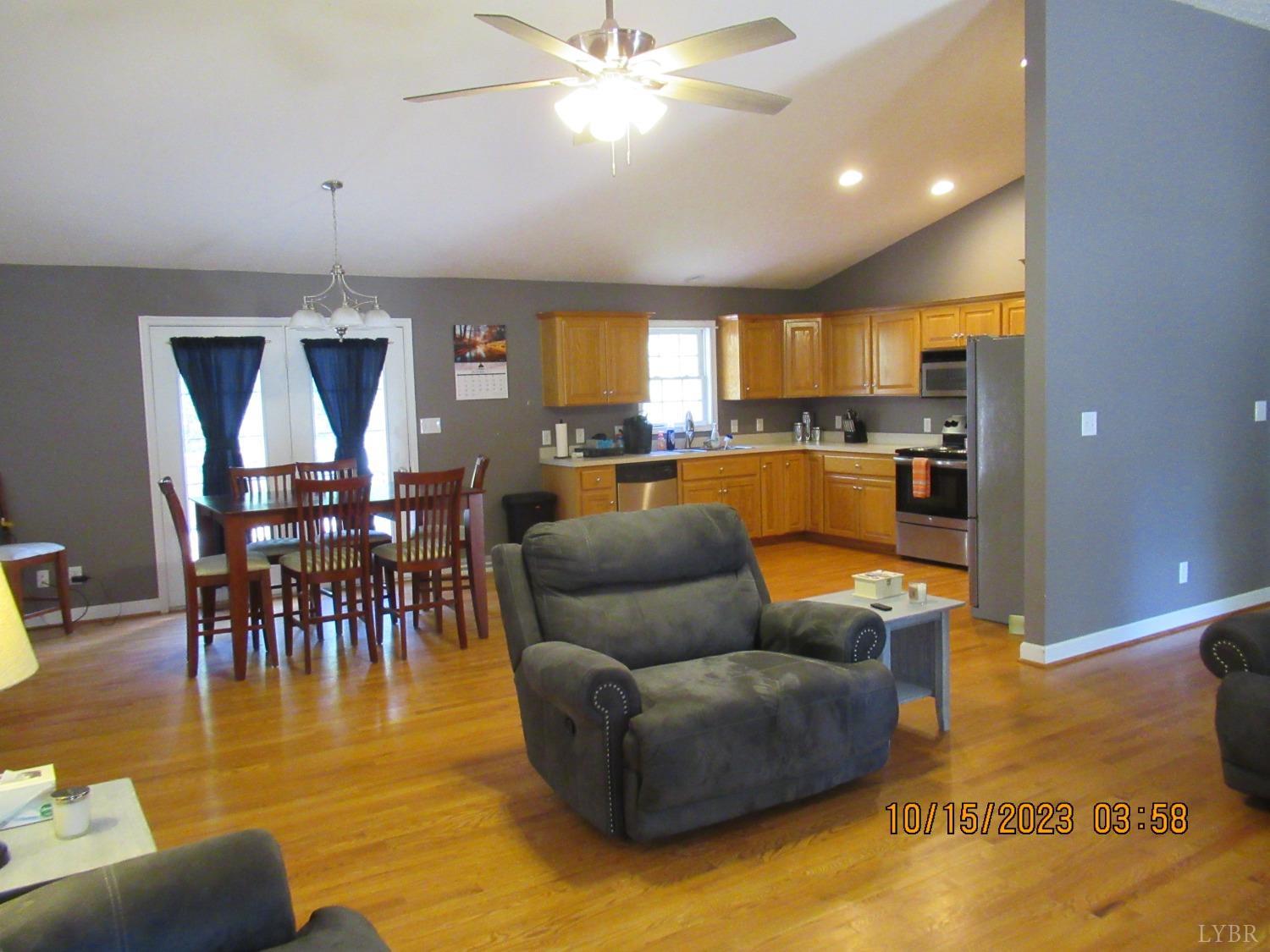 1360 Greenhouse Road Rustburg, VA 24588 - Photo 10 of 29 a living room with furniture and a large window