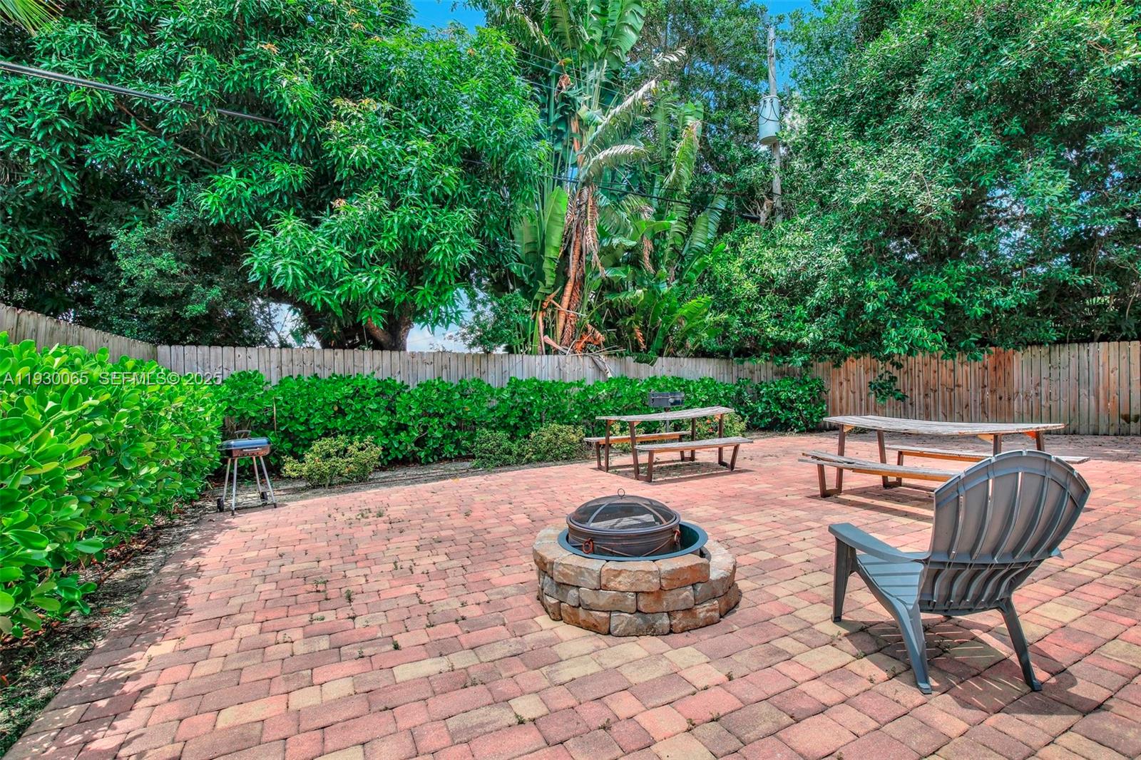 5731 Northeast 18th Avenue, Unit 4 Fort Lauderdale, FL 33334 - Photo 11 of 13 a outdoor view with a seating space